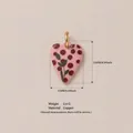 Detailed view of pink heart pendant with polka dots and leaf pattern, 15x11mm copper base - Pendant Only (Without Chain) - Heart Flower