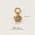 Zierlicher Blumenanhänger aus 18K vergoldetem Edelstahl mit Kristalleinlage und Details. - Edelstein Stern