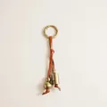 Detailed macro shot of vintage brass bell and bead on a high-quality leather strap keychain - Brown Leather Gourd Bell Charm / Brown