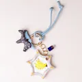 Detail of handmade star bag charm with hand-painted banana illustration - Banana Star Charm