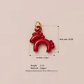 Detailed view of a red copper doll pendant with precise size and weight specifications - Red Pony Pendant