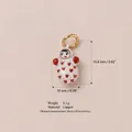 Close-up view of a cute doll pendant charm showing 15.8mm height and 3.1g weight info - White Figure with Red Heart