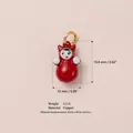 Cute red doll pendant in copper with gold-tone ring, detailed miniature charm for DIY - Red Humanoid Pendant