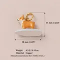 Detailed product view of a surfing Corgi charm pendant with copper material specs. - Corgi
