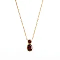 Close-up of minimalist gourd-shaped necklace with two red gemstones in gold bezel setting - January Dark Red Garnet (Gold)
