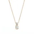 Close-up of minimalist rose gold necklace featuring a bezel-set round and oval crystal pendant - April White Rhinestone (Gold)