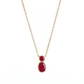 Macro view of gold bezel-set necklace featuring two vibrant red oval-cut stones - July Red Rhinestone (Gold)