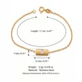 Goldfarbenes Edelstahl-Armband mit einem zylindrischen Anhänger und klarem Schmuckstein - Quadratisch Geschnittener Edelstein Goldton Armband