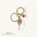Sweet heart tennis racket keychain with sparkling rhinestone and red mini ball charm. - White