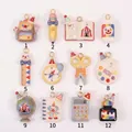 Collection de 12 breloques de papeterie créatives thème cirque pour la création de bijoux - Pendentif Uniquement (Sans Chaîne) / Design du sac à dos