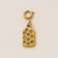 Detailed macro view of gold plated stainless steel celestial sunburst charm with crystals - Starlight Rhinestone Tag Pendant