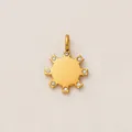 Close-up of a gold stainless steel sun pendant with crystal accents for DIY jewelry - Sunlight Rhinestone Pendant