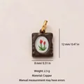 Piccolo ciondolo artigianale in rame con motivo a tulipano e smalto marrone scuro - Pendente Tulipano al Cioccolato