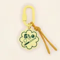Detailed close-up of yellow flower-shaped billiards themed keychain with brown cord detail - Billiards Pendant