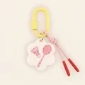 Charming badminton sports keychain featuring a yellow carabiner and pink braided cord - Badminton Style
