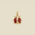 Exquisite detailed view of a gold-tone ladybug pendant with vibrant red enamel wings - Pendant Only (Without Chain) (Ladybug) / Red Gold