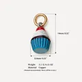 Detailed view of a cute cupcake charm for DIY jewelry with copper material specs - Blue Cake Pendant