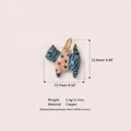 Close-up of blue enamel cat pendant with size and weight specifications - 4 Tabby Cat