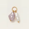 Detailed view of dual baroque pearl charm with purple and white tones on gold ring - Baroque Pearl Pendant / Purple and White