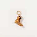 Gros plan d'un pendentif bottine marron vintage avec anneau doré à l'or 18K - Pendentif Bottines Martin