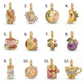 Detailed collection of 12 food and nature themed stainless steel charms in 18K gold finish - Lobster Pendant