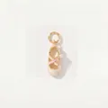 Detailed view of an elegant cream ballet slipper pendant with pink ribbon and pearl accent. - Ballet Shoes Charm