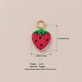Detail view of a cute 17mm red strawberry pendant made of copper with measurements. - Strawberry Shape