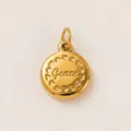 Close-up of a minimalist round gold-plated pendant with heart details and Grace engraving - Grace Style