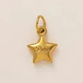 Close-up detail of a minimalist stainless steel star pendant with gold plating and Pure engraving - Pure Style