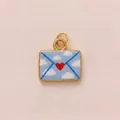 Macro view showing the heart and cloud pattern on a gold-plated envelope pendant - Heart Mailing Envelope Pendant Only