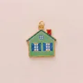 Detailed macro view of a green house-shaped enamel pendant with blue window details - Green Cottage House Pendant Only