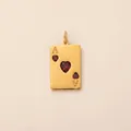 Macro detail of a 18K gold plated Ace of Hearts poker card pendant with red heart gems. - Heart Ace Poker Card Pendant / Gold