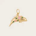 Detailed macro shot of a golden dolphin charm with pearls and pink floral enamel accents. - Dolphin Pendant