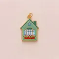 Detailed view of pastoral style house pendant with green glitter enamel and red flowers - Green Balcony House Pendant Only