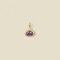 Detailed shot of an 18K gold plated pendant featuring an oval purple faceted gemstone. - Purple Oval Gemstone / February Style Gold
