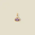 Detail shot of an oval purple gemstone pendant in 18K gold plated stainless steel - Purple Faceted Gemstone / June Style Gold