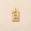 Detailed macro view of gold plated poker pendant with three blue heart shaped stones - Poker Card 3 Pendant / Gold