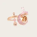 Detail showing a cute pink rabbit cake openable ring with a miniature carrot inside - Ring / Pink