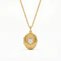 Detailed close-up of a vintage gold heart-shaped locket necklace with a sparkling crystal center - Oval Heart Locket