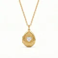 Vintage gold waterdrop locket with a heart-shaped crystal and sunburst engraving - Teardrop Heart Locket