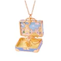 Detailed view of miniature blue suitcase necklace featuring an open windmill scene - Windmill Town Theme / Light Blue