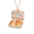 Detailed macro view of an openable rose gold suitcase necklace with mushroom house - Mushroom House Theme / Mint Green
