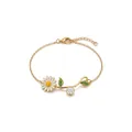 Close-up detail of golden enamel daisy bracelet with green leaves and crystal zircon. - Daisy (JFBK262603KI) / April Daisy Bracelet