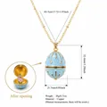 Gold-plated copper egg locket necklace with light blue enamel and hidden inner flower - August Flower (HSNK255219KI)