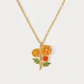 Close-up detail of a handmade orange enamel birth flower necklace with a gold chain. - October Calendula