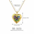 Detail view of golden heart locket necklace with floral enamel and size dimensions - February Birth Flower