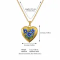 Gold heart locket necklace with blue floral enamel design and measurement details - July Birth Flower Locket Necklace / Gold