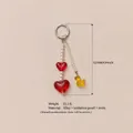 Sweet beaded keychain with red hearts and yellow duck charm for bags - Heart Duck