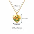 Gold-plated stainless steel heart locket necklace with floral engraving and size specs - November Birth Flower Locket Necklace / Gold