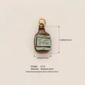 Hand-painted stainless steel brown bottle charm with vintage game screen design and gold ring - Brown Hand Drawn Bottle Pendant (Shui Hu-5)